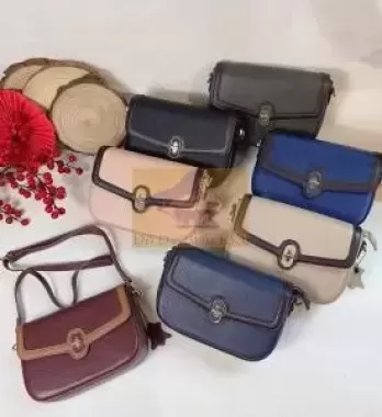 Túi Nữ Đeo Chéo Da Bò